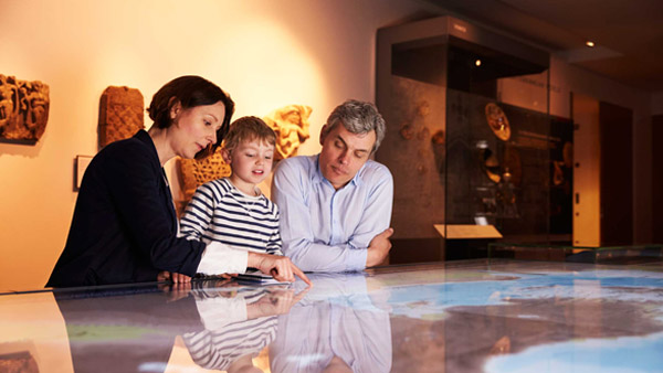 family viewing an exhibition