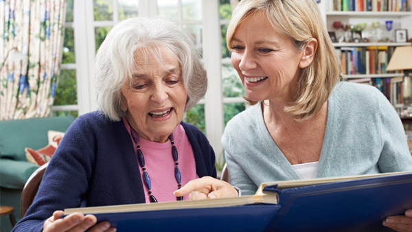 grandparents viewing photos